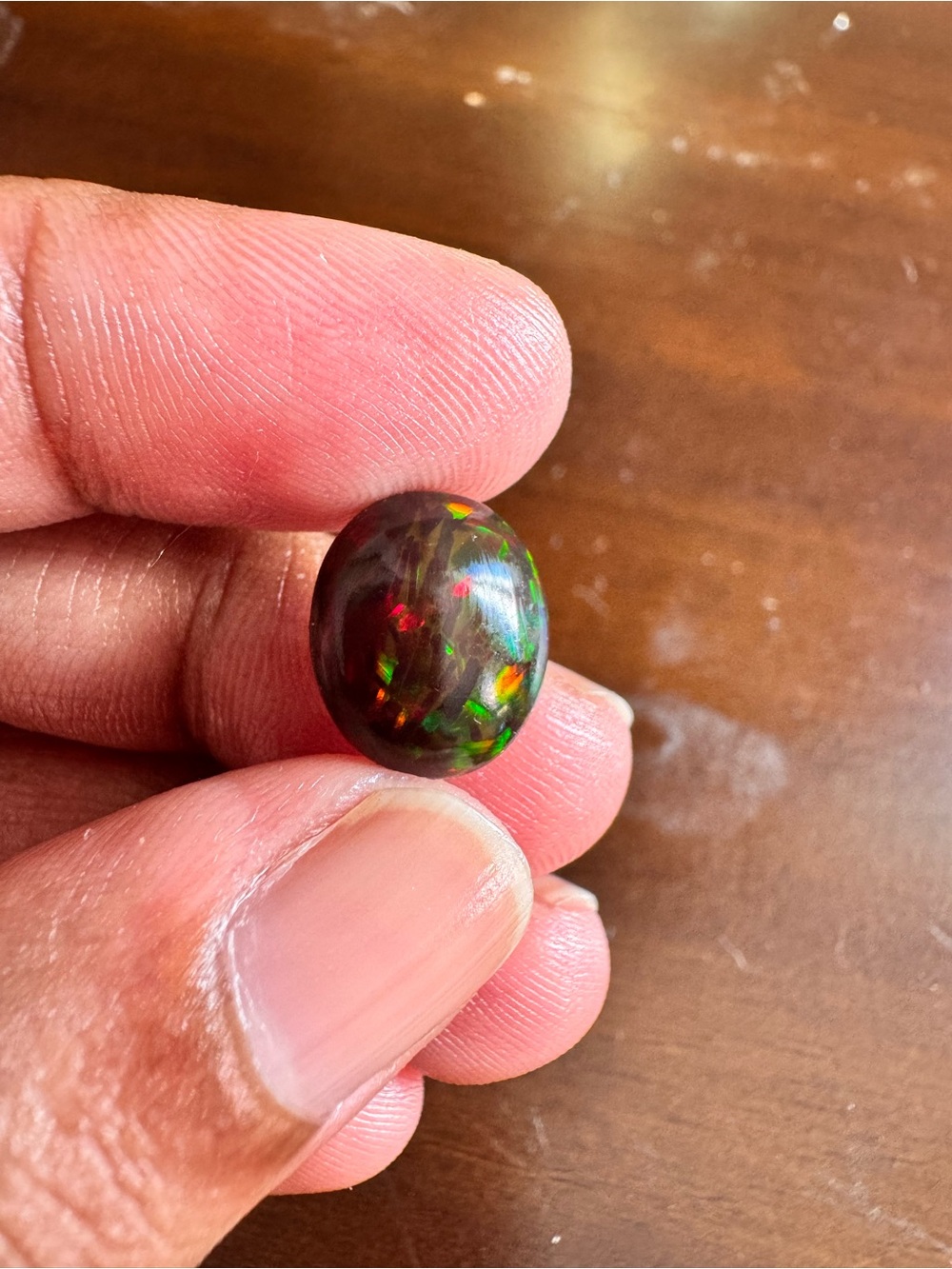 liberty Black Opal Cabochon with Red and Green Play-of-Color